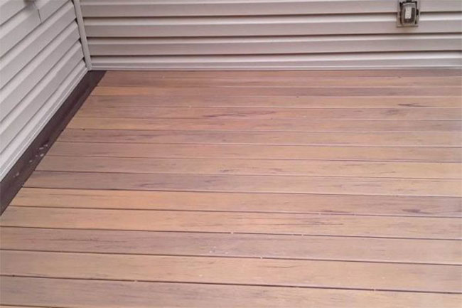 Composite deck boards after cleaning by Maverick Softwash
